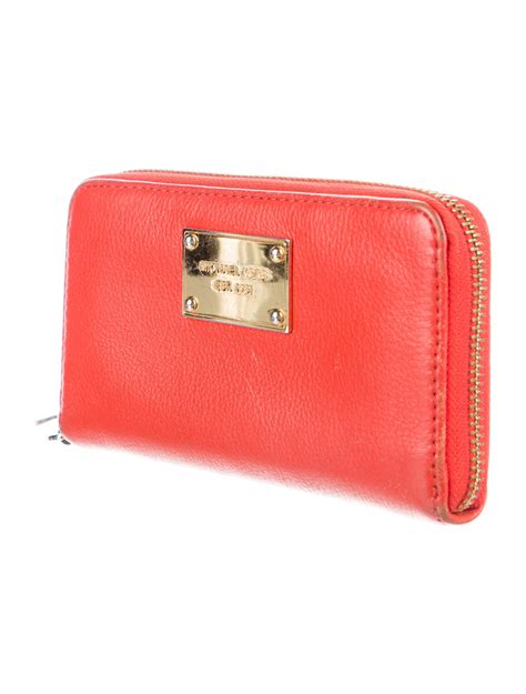 michael kors geldbeutel orange|michael kors leather wallet.